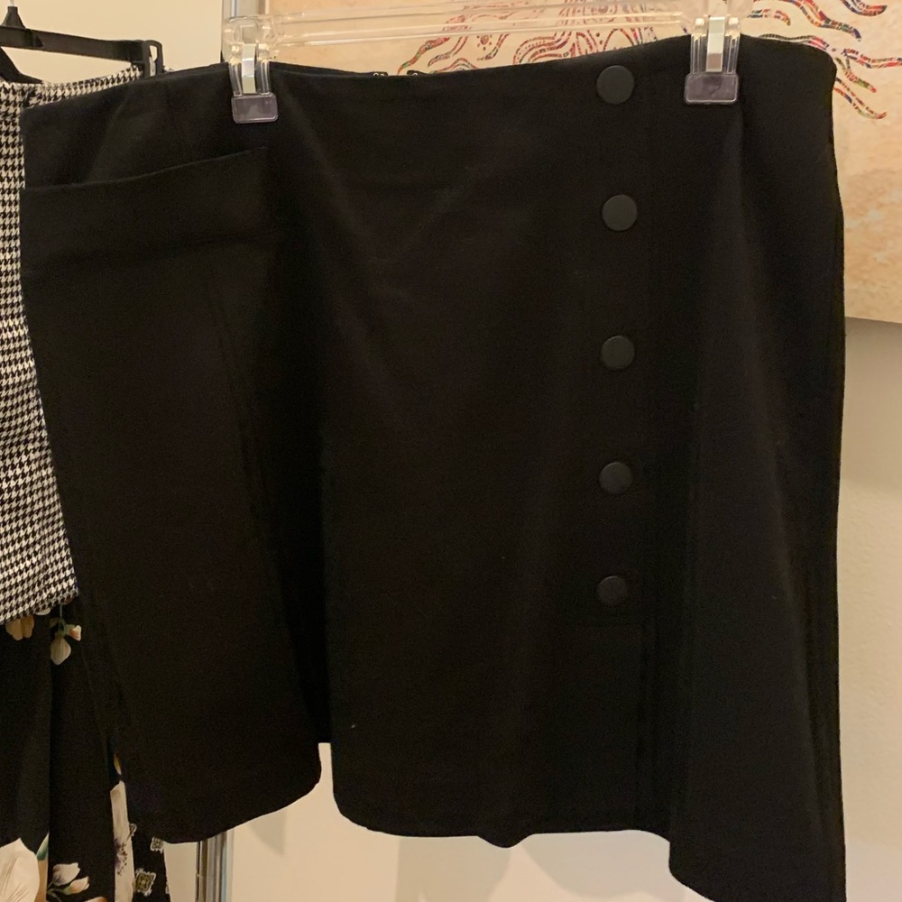 black, cotton mini skirt with accent buttons